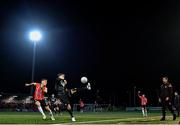 13 September 2022; Paddy Kirk of Sligo Rovers in action against Ronan Boyce of Derry City, watched by Derry City manager Ruaidhrí Higgins, during the SSE Airtricity League Premier Division match between Derry City and Sligo Rovers at The Ryan McBride Brandywell Stadium in Derry. Photo by Ramsey Cardy/Sportsfile