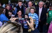14 September 2022; Ireland team manager Michael Blake, alongside riders Max Wachman and Cian O'Connor pose for photographs with attendees as the The Aga Khan trophy is brought to Tuamgraney, Clare, following Ireland's victory in the Longines FEI Jumping Nations Cup at the Dublin Horse Show. Photo by Sam Barnes/Sportsfile