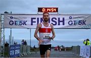 14 September 2022; Thomas McStay crosses the line to win the Grant Thornton Corporate 5K Challenge at Claddagh in Galway. Photo by David Fitzgerald/Sportsfile