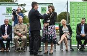 14 September 2022; Mayor of Tuamgraney Mary Coffey is interviewed by MC Brendan McArdle as the The Aga Khan trophy is brought to Tuamgraney, Clare, following Ireland's victory in the Longines FEI Jumping Nations Cup at the Dublin Horse Show. Photo by Sam Barnes/Sportsfile