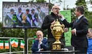 14 September 2022; Sport Ireland Director of National Governing Bodies & High Performance, Paul McDermott, left, is interviewed by MC Brendan McArdle as the The Aga Khan trophy is brought to Tuamgraney, Clare, following Ireland's victory in the Longines FEI Jumping Nations Cup at the Dublin Horse Show. Photo by Sam Barnes/Sportsfile
