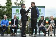 14 September 2022; Team Ireland rider Max Wachman, right, is interviewed by MC Brendan McArdle as the The Aga Khan trophy is brought to Tuamgraney, Clare, following Ireland's victory in the Longines FEI Jumping Nations Cup at the Dublin Horse Show. Photo by Sam Barnes/Sportsfile