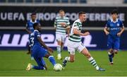 15 September 2022; Ronan Finn of Shamrock Rovers is tackled by Jordan Torunarigha of Gent during the UEFA Europa Conference League Group F match between Gent and Shamrock Rovers at KAA Gent Stadium in Gent, Belgium. Photo by Stephen McCarthy/Sportsfile