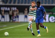 15 September 2022; Rory Gaffney of Shamrock Rovers in action against Jordan Torunarigha of Gent during the UEFA Europa Conference League Group F match between Gent and Shamrock Rovers at KAA Gent Stadium in Gent, Belgium. Photo by Stephen McCarthy/Sportsfile