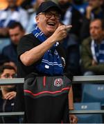 15 September 2022; (EDITORS NOTE: IMAGE CONTAINS EXPLICIT LANGUAGE) A Bohemians supporting Gent fan taunts Shamrock Rovers players during the UEFA Europa Conference League Group F match between Gent and Shamrock Rovers at KAA Gent Stadium in Gent, Belgium. Photo by Stephen McCarthy/Sportsfile