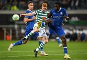 15 September 2022; Rory Gaffney of Shamrock Rovers in action against Bruno Godeau, left, and Michael Ngadeu-Ngadjui of Gent during the UEFA Europa Conference League Group F match between Gent and Shamrock Rovers at KAA Gent Stadium in Gent, Belgium. Photo by Stephen McCarthy/Sportsfile