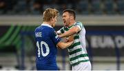 15 September 2022; Aaron Greene of Shamrock Rovers tussles with Jens Petter Hauge of Gent during the UEFA Europa Conference League Group F match between Gent and Shamrock Rovers at KAA Gent Stadium in Gent, Belgium. Photo by Stephen McCarthy/Sportsfile