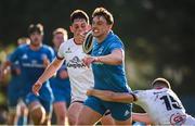 16 September 2022; Craig Adams of Leinster is tackled by Shea O’Brien of Ulster during the A Interprovinical match between Leinster A and Ulster A at Templeville Road in Dublin. Photo by Brendan Moran/Sportsfile
