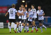 16 September 2022; Paul Doyle of Dundalk, centre, celebrates with his teammates after scoring their side's first goal during the Extra.ie FAI Cup Quarter-Final match between Waterford and Dundalk at the RSC in Waterford. Photo by Ben McShane/Sportsfile