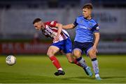 16 September 2022; Lee Devitt of Treaty United in action against Thomas Lonergan of UCD during the Extra.ie FAI Cup Quarter-Final match between Treaty United and UCD at Markets Field in Limerick. Photo by Seb Daly/Sportsfile