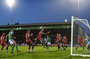 16 September 2022; Ally Gilchrist of Cork City heads at goal despite the attention of Charlie Lyons of Galway United during the SSE Airtricity League First Division match between Galway United and Cork City at Eamonn Deacy Park in Galway. Photo by Ramsey Cardy/Sportsfile