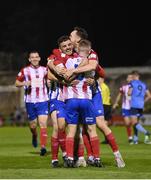 16 September 2022; Willie Armshaw of Treaty United, back to camera, celebrates with teammates after scoring their side's fourth goal during the Extra.ie FAI Cup Quarter-Final match between Treaty United and UCD at Markets Field in Limerick. Photo by Seb Daly/Sportsfile