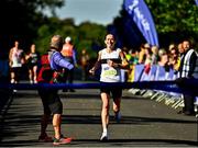 17 September 2022; Barbara Cleary of Donore Harriers crosses the line to finish as first female at the Irish Life Dublin Half Marathon on Saturday 17th of September in the Phoenix Park, Dublin. Photo by Sam Barnes/Sportsfile