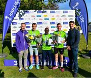 17 September 2022; Irish Life Corporate Business managing director Oisin O'Shaughnessy, left, and Minister of State for Sport and the Gaeltacht Jack Chambers, TD, right, with first place male Peter Somba of Dunboyne AC, centre, second place Graham Gilshinan of Portmarnock AC, right, and third place Martin Hoare of Celbridge AC, left, at the Irish Life Dublin Half Marathon on Saturday 17th of September in the Phoenix Park, Dublin. Photo by Sam Barnes/Sportsfile