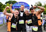 17 September 2022; Runners, from left, Conor Fitzpatrick, David Shanahan, George McCabe and Frank Tate, celebrate after finishing the Irish Life Dublin Half Marathon on Saturday 17th of September in the Phoenix Park, Dublin. Photo by Sam Barnes/Sportsfile