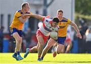 17 September 2022; Eoghan O'Donnell of Whitehall Colmcille in action against Paddy Quinn, left, and Micheal Day of Na Fianna during the Dublin County Senior Club Football Championship Quarter-Final match between Na Fianna and Whitehall Colmcille at Parnell Park in Dublin. Photo by Ben McShane/Sportsfile