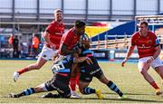 17 September 2022; Malakai Fekitoa of Munster is tackled by Jarrod Evans and Gareth Anscombe, left, of Cardiff during the United Rugby Championship match between Cardiff and Munster at Cardiff Arms Park in Cardiff, Wales. Photo by Sean Alabaster/Sportsfile