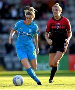 17 September 2022; Kate Mooney of DLR Waves in action against Chloe Darby of Bohemians during the SSE Airtricity Women's National League match between Bohemians and DLR Waves at Dalymount Park in Dublin. Photo by Tyler Miller/Sportsfile