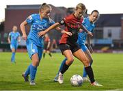 17 September 2022; Bohemians captain Erica Burke in action against Nicole Keogh, left, and Kerri Letmon of DLR Waves during the SSE Airtricity Women's National League match between Bohemians and DLR Waves at Dalymount Park in Dublin. Photo by Tyler Miller/Sportsfile