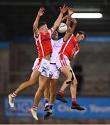 17 September 2022; Craig Dias of Kilmacud Crokes fields a high-ball despite the attention of Peter Duffy, left, and Niall James of Cuala during the Dublin County Senior Club Football Championship Quarter-Final match between Kilmacud Crokes and Cuala at Parnell Park in Dublin. Photo by Ben McShane/Sportsfile