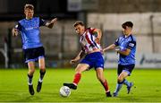 16 September 2022; Matt Keane of Treaty United in action against Alex Nolan, left, and Donal Higgins of UCD during the Extra.ie FAI Cup Quarter-Final match between Treaty United and UCD at Markets Field in Limerick. Photo by Seb Daly/Sportsfile