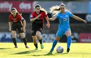 17 September 2022; Fiona Donnelly of DLR Waves in action against Rachel Doyle of Bohemians during the SSE Airtricity Women's National League match between Bohemians and DLR Waves at Dalymount Park in Dublin. Photo by Tyler Miller/Sportsfile