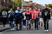 18 September 2022; Shelbourne supporters make their way to the stadium before the Extra.ie FAI Cup Quarter-Final match between Shelbourne and Bohemians at Tolka Park in Dublin. Photo by Seb Daly/Sportsfile