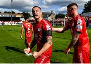 18 September 2022; Shelbourne captain Luke Byrne celebrates his side's first goal, scored by teammate Jack Moylan, not pitcutred, during the Extra.ie FAI Cup Quarter-Final match between Shelbourne and Bohemians at Tolka Park in Dublin. Photo by Seb Daly/Sportsfile