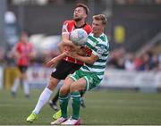 18 September 2022; Dan Cleary of Shamrock Rovers in action against Will Patching of Derry City during the Extra.ie FAI Cup Quarter-Final match between Derry City and Shamrock Rovers at The Ryan McBride Brandywell Stadium in Derry. Photo by Stephen McCarthy/Sportsfile