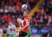 18 September 2022; Jamie McGonigle of Derry City in action against Andy Lyons of Shamrock Rovers during the Extra.ie FAI Cup Quarter-Final match between Derry City and Shamrock Rovers at The Ryan McBride Brandywell Stadium in Derry. Photo by Stephen McCarthy/Sportsfile