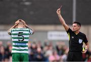 18 September 2022; Referee Rob Hennessy shows Lee Grace of Shamrock Rovers a red card during the Extra.ie FAI Cup Quarter-Final match between Derry City and Shamrock Rovers at The Ryan McBride Brandywell Stadium in Derry. Photo by Stephen McCarthy/Sportsfile