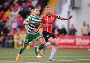 18 September 2022; Patrick McEleney of Derry City is fouled by Lee Grace of Shamrock Rovers, resulting in a penalty and a red card, during the Extra.ie FAI Cup Quarter-Final match between Derry City and Shamrock Rovers at The Ryan McBride Brandywell Stadium in Derry. Photo by Stephen McCarthy/Sportsfile