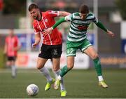 18 September 2022; Will Patching of Derry City in action against Sean Gannon of Shamrock Rovers during the Extra.ie FAI Cup Quarter-Final match between Derry City and Shamrock Rovers at The Ryan McBride Brandywell Stadium in Derry. Photo by Stephen McCarthy/Sportsfile