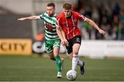 18 September 2022; Cameron McJannet of Derry City in action against Jack Byrne of Shamrock Rovers during the Extra.ie FAI Cup Quarter-Final match between Derry City and Shamrock Rovers at The Ryan McBride Brandywell Stadium in Derry. Photo by Stephen McCarthy/Sportsfile