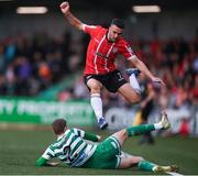 18 September 2022; Michael Duffy of Derry City avoids the tackle of Sean Gannon of Shamrock Rovers during the Extra.ie FAI Cup Quarter-Final match between Derry City and Shamrock Rovers at The Ryan McBride Brandywell Stadium in Derry. Photo by Stephen McCarthy/Sportsfile