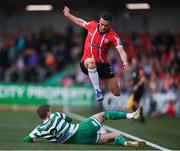 18 September 2022; Michael Duffy of Derry City avoids the tackle of Sean Gannon of Shamrock Rovers during the Extra.ie FAI Cup Quarter-Final match between Derry City and Shamrock Rovers at The Ryan McBride Brandywell Stadium in Derry. Photo by Stephen McCarthy/Sportsfile