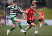 18 September 2022; Michael Duffy of Derry City in action against Gary O'Neill of Shamrock Rovers during the Extra.ie FAI Cup Quarter-Final match between Derry City and Shamrock Rovers at The Ryan McBride Brandywell Stadium in Derry. Photo by Stephen McCarthy/Sportsfile