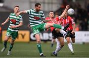 18 September 2022; Michael Duffy of Derry City in action against Chris McCann of Shamrock Rovers during the Extra.ie FAI Cup Quarter-Final match between Derry City and Shamrock Rovers at The Ryan McBride Brandywell Stadium in Derry. Photo by Stephen McCarthy/Sportsfile