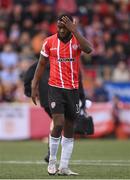 18 September 2022; James Akintunde of Derry City after a collision with Shamrock Rovers goalkeeer Leon Pohls during the Extra.ie FAI Cup Quarter-Final match between Derry City and Shamrock Rovers at The Ryan McBride Brandywell Stadium in Derry. Photo by Stephen McCarthy/Sportsfile