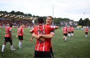 18 September 2022; Daniel Lafferty of Derry City celebrates with teammte Ronan Boyce after scoring his side's second goal during the Extra.ie FAI Cup Quarter-Final match between Derry City and Shamrock Rovers at The Ryan McBride Brandywell Stadium in Derry. Photo by Stephen McCarthy/Sportsfile