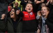 18 September 2022; Four-year-old Derry City supporter Braelin Diver celebrates their side's second goal during the Extra.ie FAI Cup Quarter-Final match between Derry City and Shamrock Rovers at The Ryan McBride Brandywell Stadium in Derry. Photo by Stephen McCarthy/Sportsfile