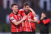 18 September 2022; Derry City players Cameron McJannet and Will Patching after their side's victory in the Extra.ie FAI Cup Quarter-Final match between Derry City and Shamrock Rovers at The Ryan McBride Brandywell Stadium in Derry. Photo by Stephen McCarthy/Sportsfile