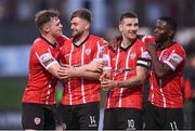 18 September 2022; Derry City players, from left, Cameron McJannet, Will Patching, Patrick McEleney and James Akintunde after their side's victory in the Extra.ie FAI Cup Quarter-Final match between Derry City and Shamrock Rovers at The Ryan McBride Brandywell Stadium in Derry. Photo by Stephen McCarthy/Sportsfile