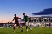 16 September 2022; Ruairi Keating of Cork City in action against James Finnerty of Galway United during the SSE Airtricity League First Division match between Galway United and Cork City at Eamonn Deacy Park in Galway. Photo by Ramsey Cardy/Sportsfile