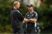 19 September 2022; Backs coach Andrew Goodman speaks with head coach Leo Cullen during a Leinster Rugby squad training session at UCD in Dublin. Photo by Harry Murphy/Sportsfile