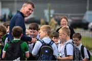 19 September 2022; Manager Stephen Kenny signs autographs for school children after a Republic of Ireland training session at the FAI National Training Centre in Abbotstown, Dublin. Photo by Stephen McCarthy/Sportsfile