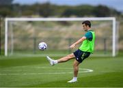 19 September 2022; Seamus Coleman practices his GAA skills during a Republic of Ireland training session at the FAI National Training Centre in Abbotstown, Dublin. Photo by Stephen McCarthy/Sportsfile