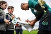 19 September 2022; Goalkeeper Gavin Bazunu signs autographs for pupils from Latnamard National School, Monaghan, after a Republic of Ireland training session at the FAI National Training Centre in Abbotstown, Dublin. Photo by Stephen McCarthy/Sportsfile
