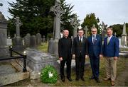 20 September 2022; Uachtarán Chumann Lúthchleas Gael Larry McCarthy, second from right, in the company of from left, Monsignor Eoin Thynne, Ard Stiúrthóir of the GAA Tom Ryan and Manager of the Michael Cusack Centre Tim Madden, after placing a wreath on the grave of Michael Cusack at Glasnevin cemetery in Dublin, in a ceremony marking the 175th anniversary of the birth of the Clare school teacher who played a pivotal role in the formation of the GAA in 1884. Photo by Brendan Moran/Sportsfile