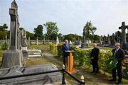 20 September 2022; Uachtarán Chumann Lúthchleas Gael Larry McCarthy, in the company of Monsignor Eoin Thynne and GAA history committee member Cian Murphy, speaking before placing a wreath at the grave of Michael Cusack at Glasnevin cemetery in Dublin, in a ceremony marking the 175th anniversary of the birth of the Clare school teacher who played a pivotal role in the formation of the GAA in 1884. Photo by Brendan Moran/Sportsfile